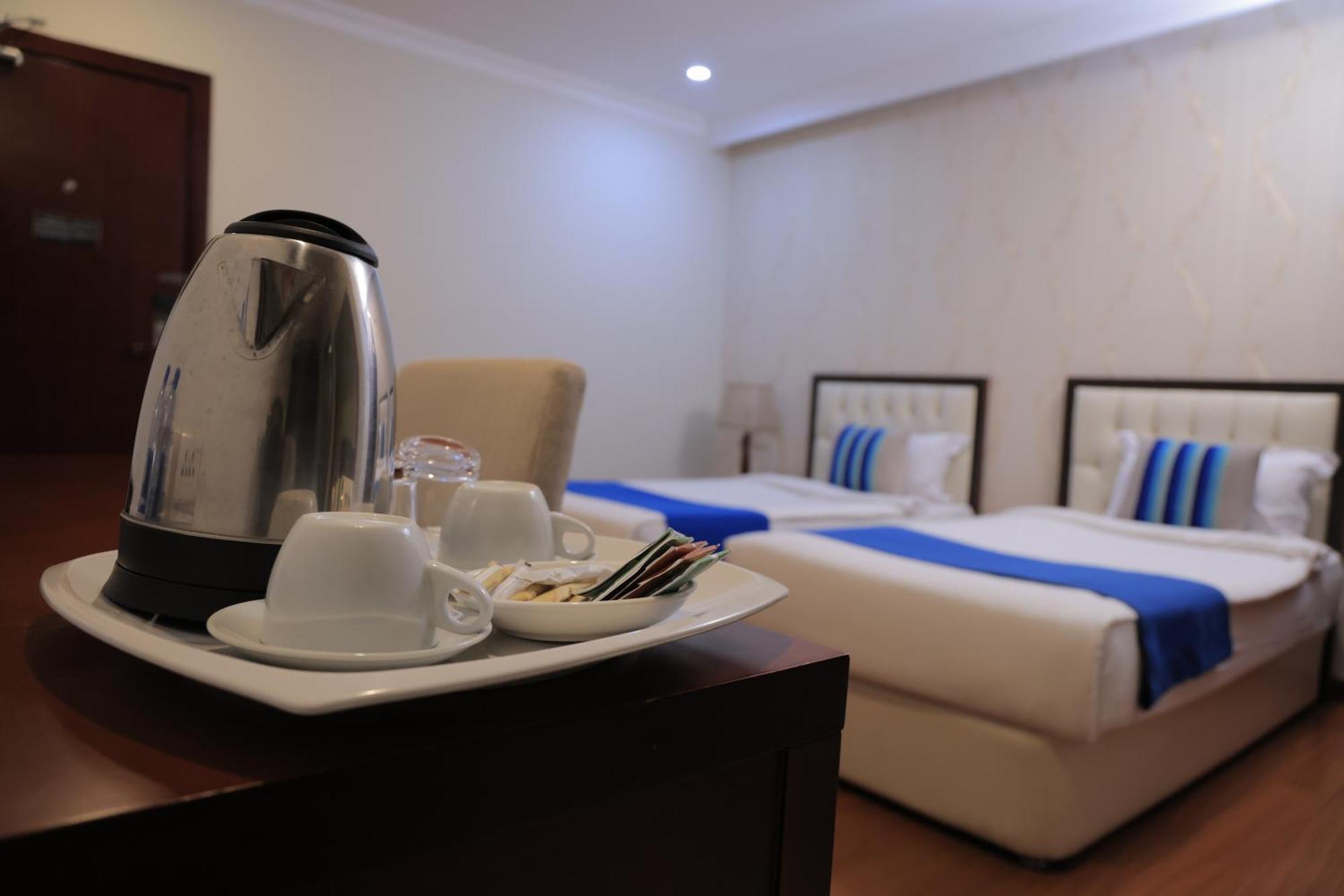 Tolip Olympia Hotel แอดดิสอาบาบา ห้อง รูปภาพ